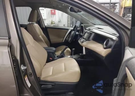 2015 Toyota Rav4 Limited z USA, uszkodzony, nr VIN JTMDFREV6FD099983